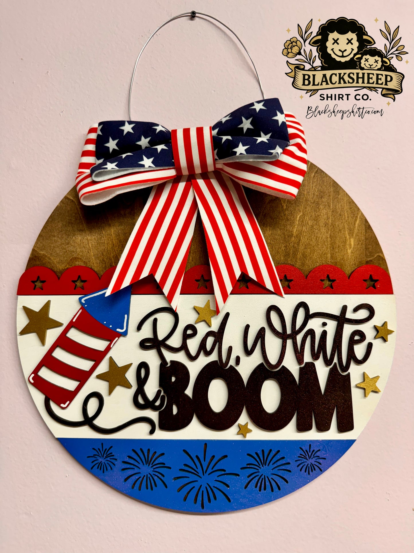 Red white and BOOM door hanger
